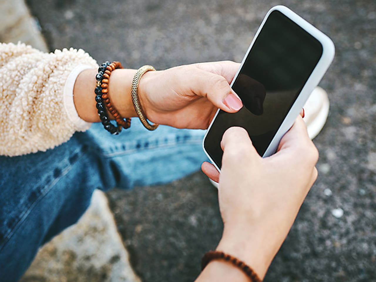 Photo of person holding a cell phone